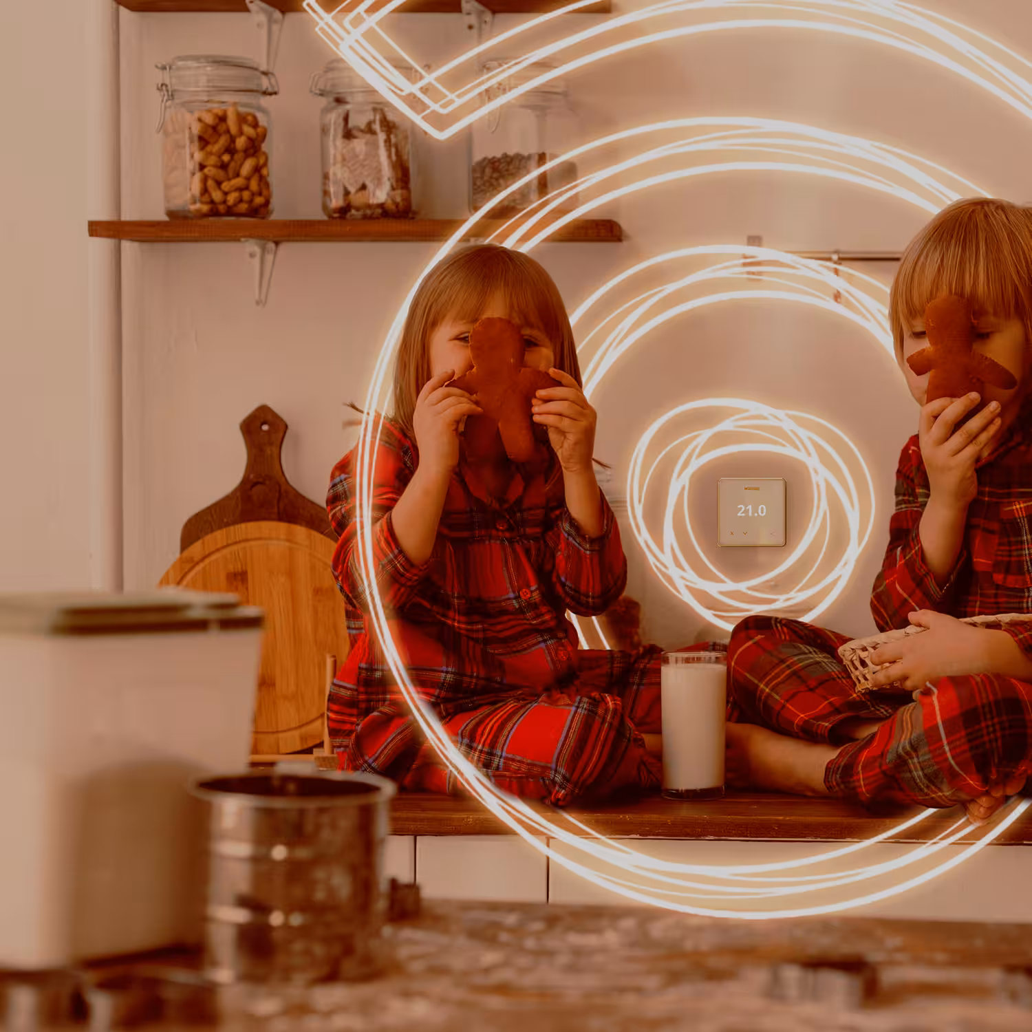 Kinder genießen einen warmen Innenraum, der durch einen intelligenten Heizungsthermostat geregelt wird